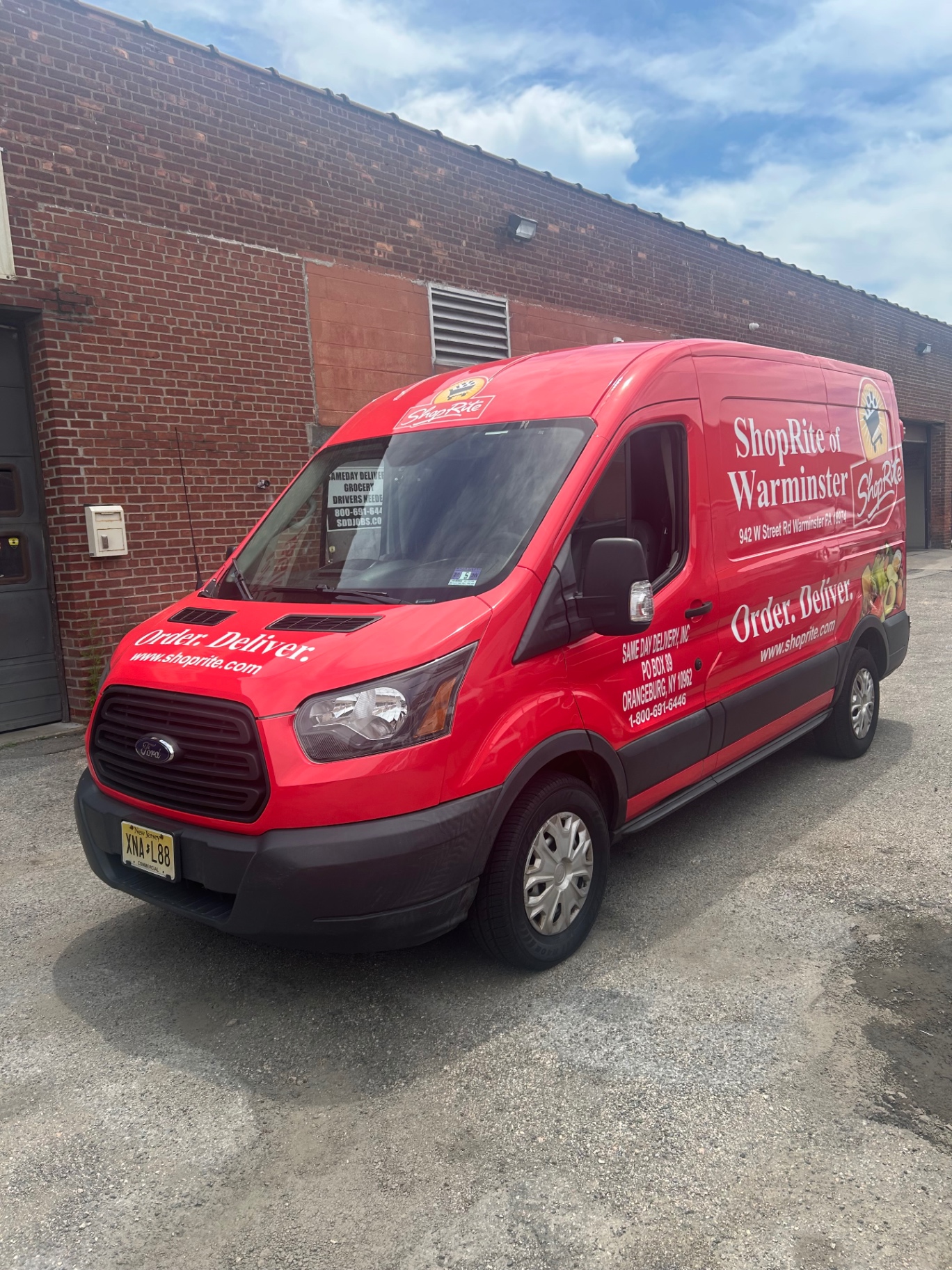 SameDay Delivery ShopRite-branded Ford Transit van at the yard