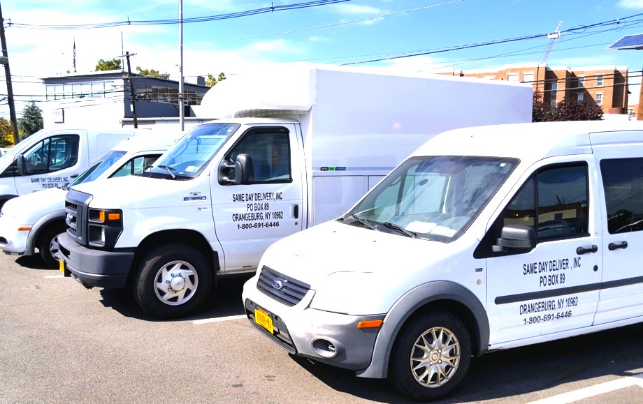 SameDay Delivery fleet lined up at the yard